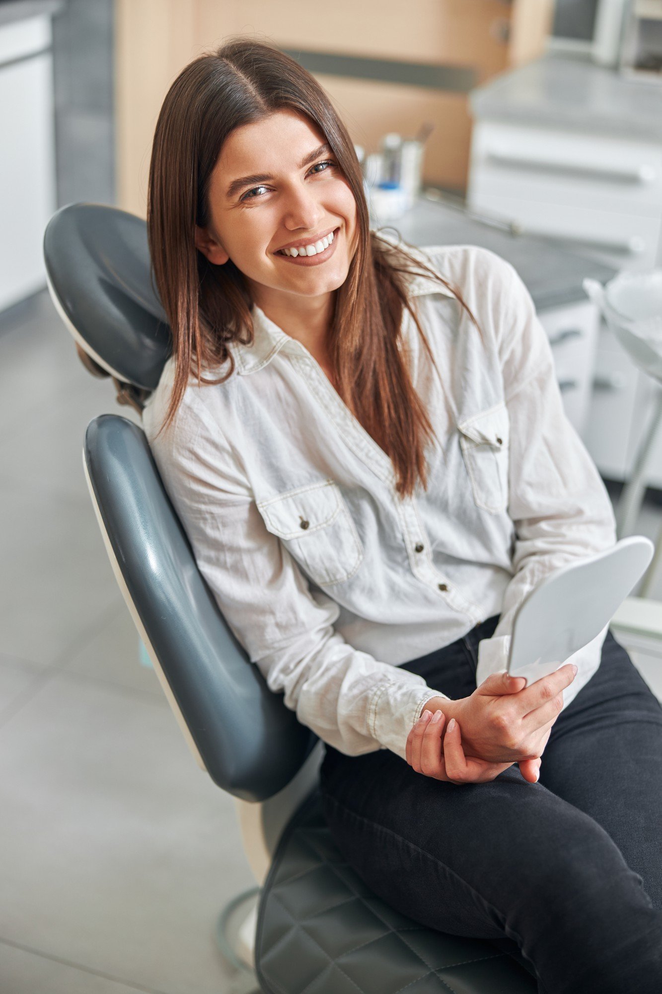 Happy new patient at All Smiles Dental Care, Calgary