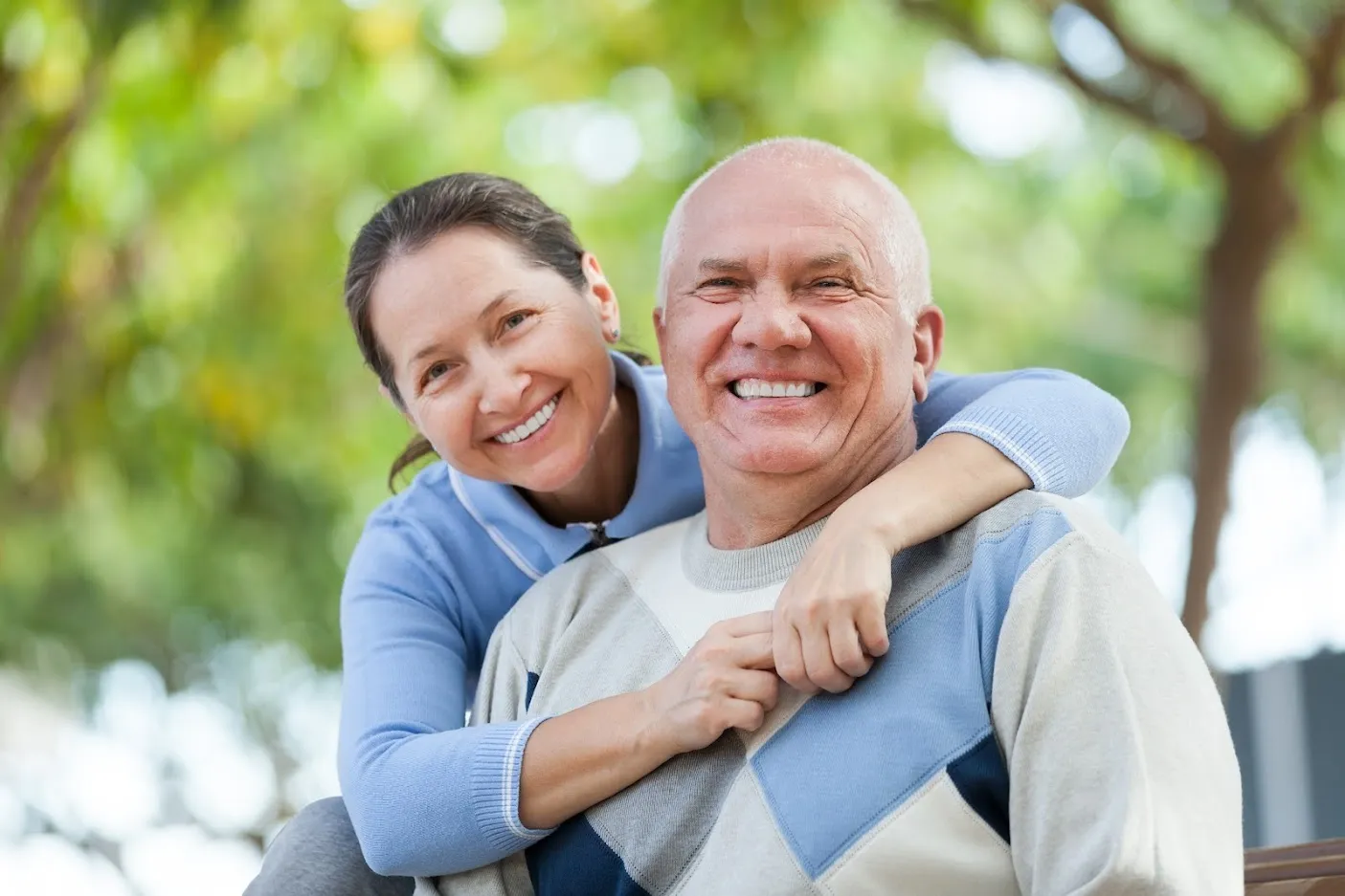 Confident senior couple enjoying their smiles — All Smiles Dental Care